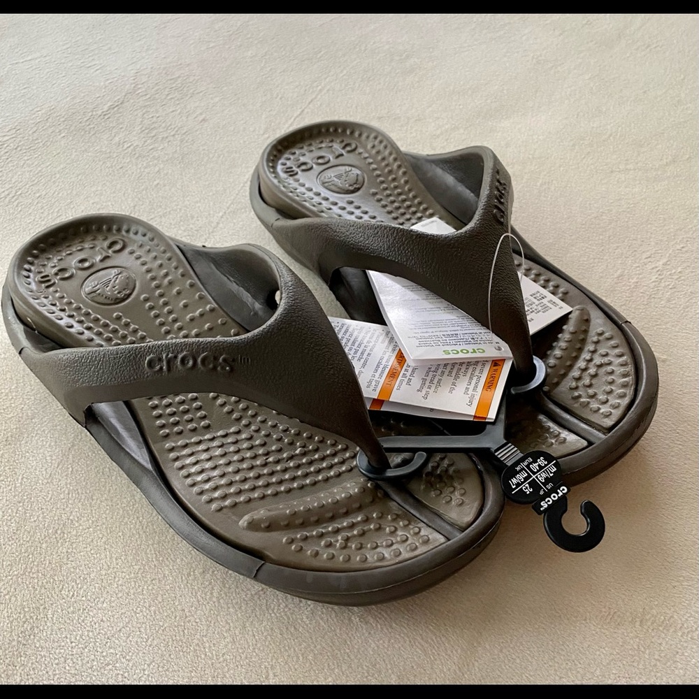 Unisex brand new with tags.  Listed as mens size 7 or womens size 9.